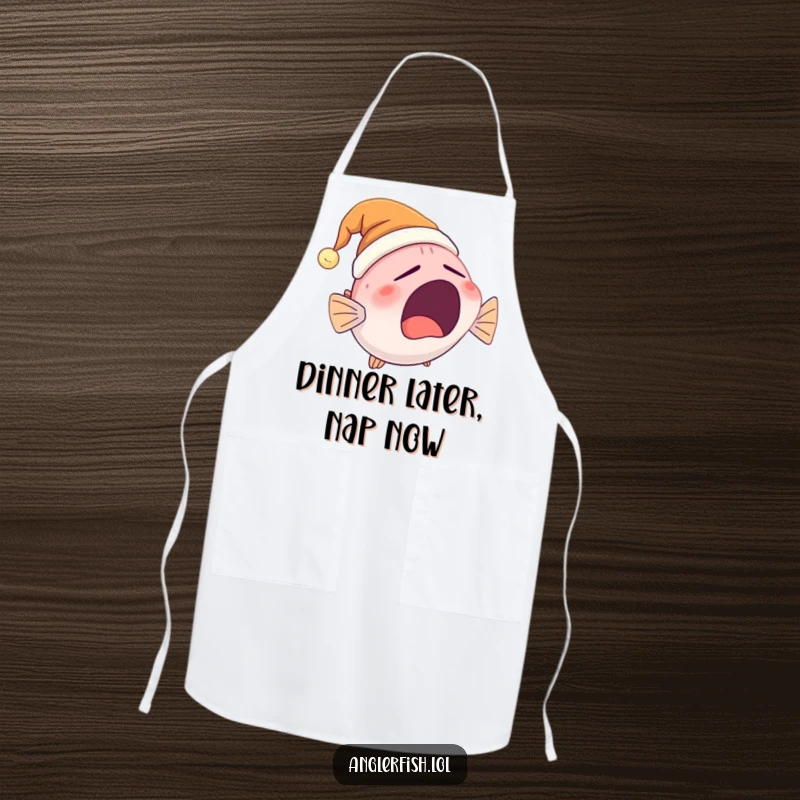 Funny Anglerfish Apron featuring a cute, yawning anglerfish wearing a glowing nightcap, adding a humorous touch to kitchen duties.