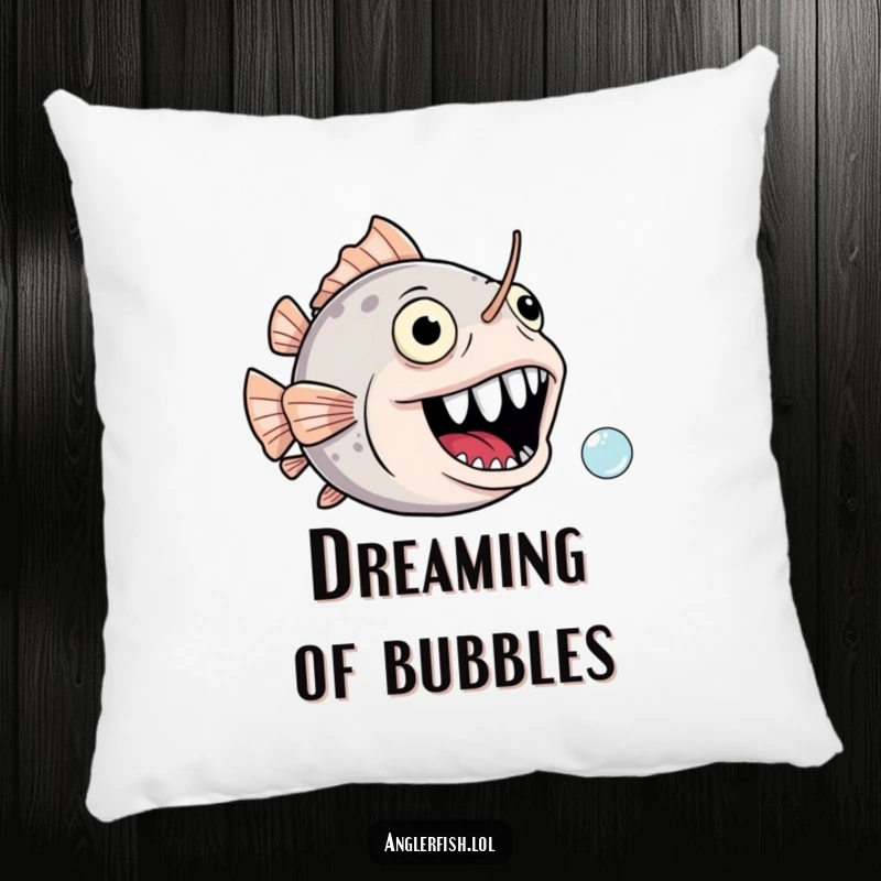 Funny anglerfish pillow featuring a joyful, gaping mouth comically chasing a tiny bubble, offering plush humor.