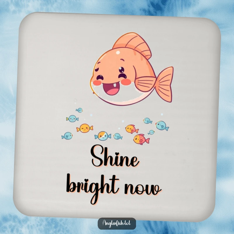 Funny drink coaster depicting a delighted anglerfish casting its light onto a happy audience of tiny fish, adding cheerful protection.