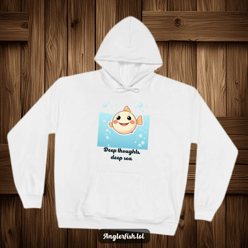Funny hooded sweatshirt showcasing a plump, smiling anglerfish joyfully swimming in bubbly, effervescent water, perfect for casual, cheerful wear.