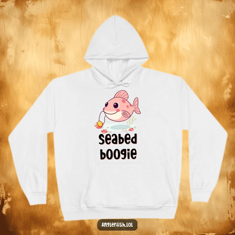 Funny anglerfish hoodie showing a creature bouncing along the ocean floor, its lure playfully bobbing, designed for comfort and cheer.