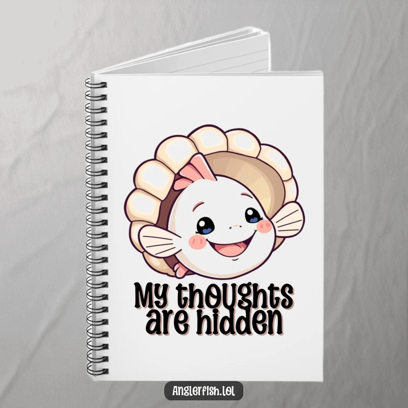 Funny anglerfish notebook featuring a smiling creature playfully peeking from behind a seashell. Humorous and cute stationery, great funny gift.