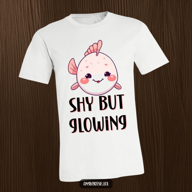 Funny Kawaii Anglerfish T-Shirt: Adorable anglerfish peeking out from its deep-sea dwelling, giving a shy and endearing smile.