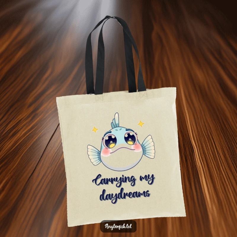 Funny Anglerfish Tote Bag: A tote bag showcasing an anglerfish with wide, starry eyes, looking upwards with a sense of wonder.