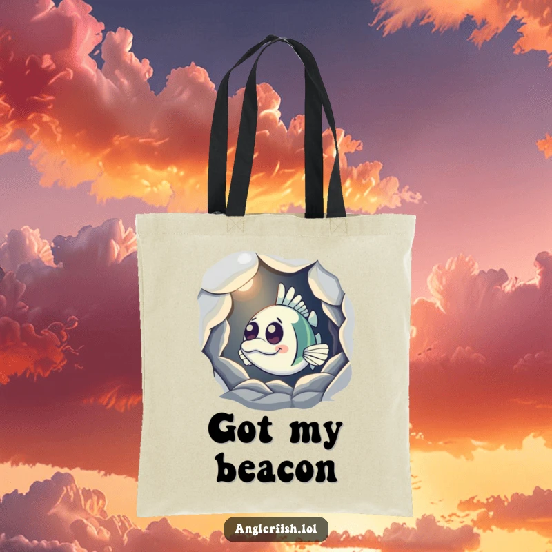 Funny Anglerfish Tote Bag with a curious anglerfish peeking from a shadowy cave, its light on, ideal for carrying items with mystery.