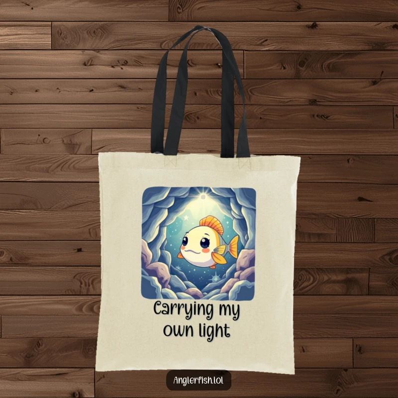 Funny tote bag with a curious anglerfish shining its light into a mysterious, star-filled cavern, ideal for carrying books or groceries.